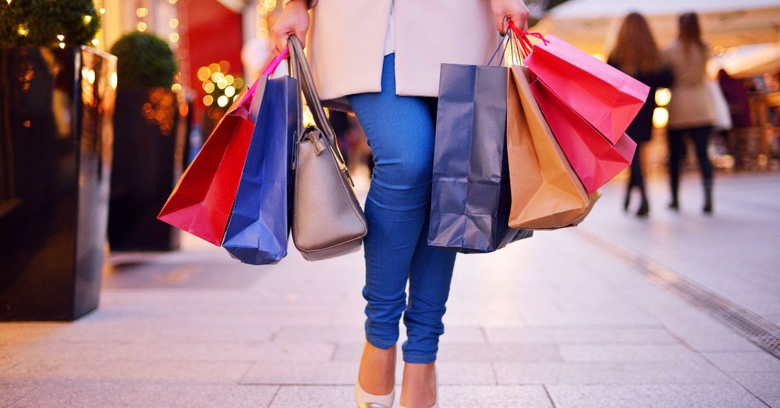 A lady carrying shopping bags